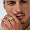 ofir_A_photo_of_a_male_model_wearing_the_ring_I_uploaded_for__e78ae09a-a442-4fc1-bb0a-5124e978d7f2_0