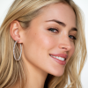 ofir_An_earring_on_a_model_the_models_entire_face_must_be_sho_e293bd0b-ed89-484c-bf38-e8c569978456_1